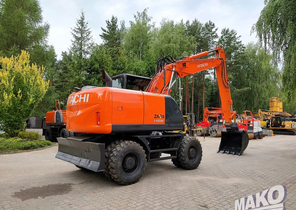Hitachi ZX 140 - Колісний екскаватор: фото 4 Hitachi ZX 140 - Колісний екскаватор: фото 4