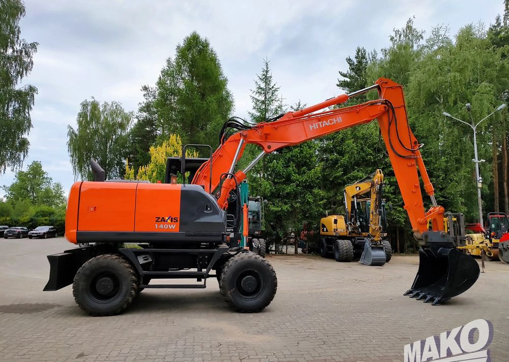 Hitachi ZX 140 - Колісний екскаватор: фото 5 Hitachi ZX 140 - Колісний екскаватор: фото 5