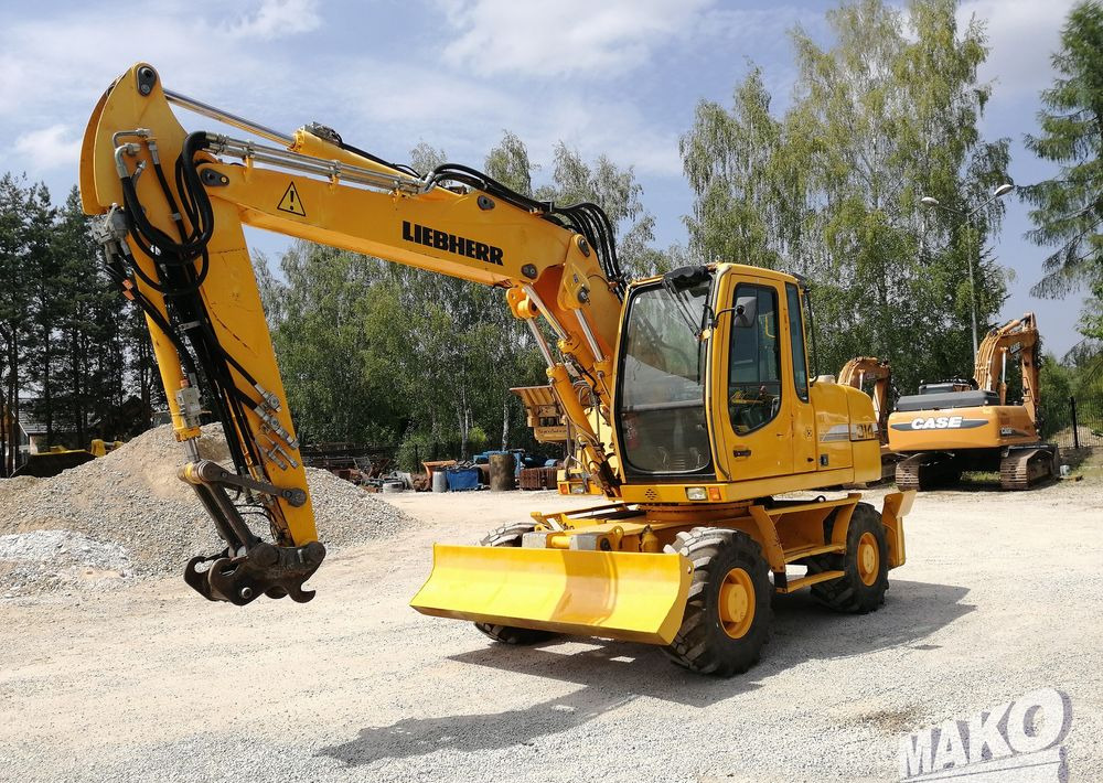 Liebherr A 314 Litronic - Колісний екскаватор: фото 1 Liebherr A 314 Litronic - Колісний екскаватор: фото 1
