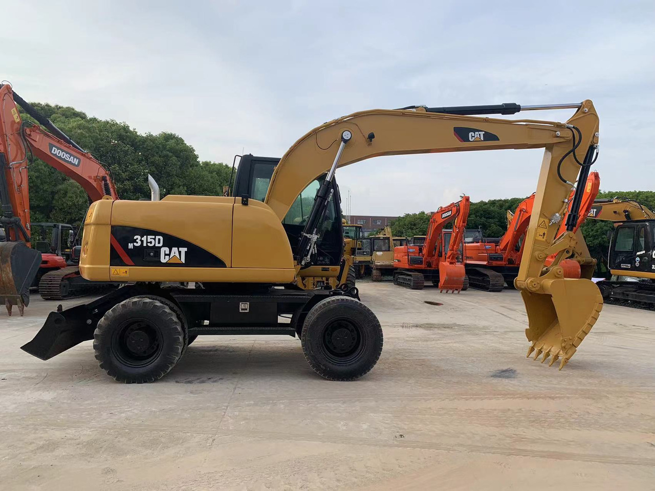 Caterpillar M315D Wheel Excavator Moving by Tires - Колісний екскаватор: фото 1 Caterpillar M315D Wheel Excavator Moving by Tires - Колісний екскаватор: фото 1