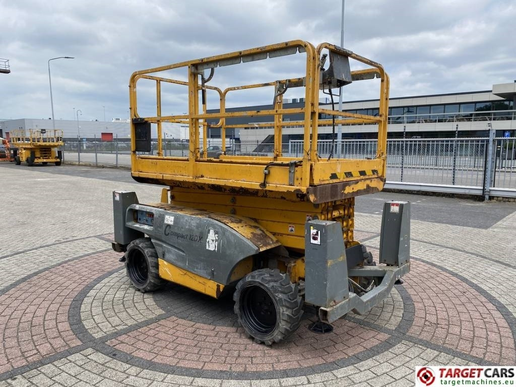 Haulotte Compact 12DX Diesel 4x4 Scissor Work Lift 1206cm - Ножичний підйомник: фото 2 Haulotte Compact 12DX Diesel 4x4 Scissor Work Lift 1206cm - Ножичний підйомник: фото 2
