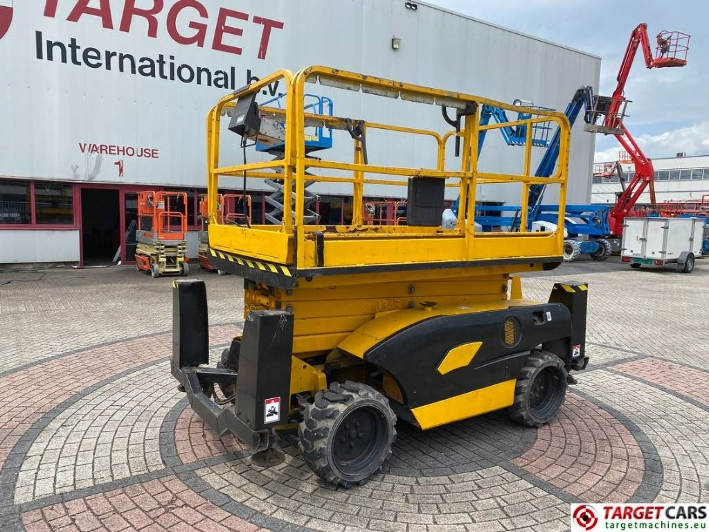 Haulotte Compact 12DX Diesel 4x4 Scissor Work Lift 1206cm - Ножичний підйомник: фото 1 Haulotte Compact 12DX Diesel 4x4 Scissor Work Lift 1206cm - Ножичний підйомник: фото 1