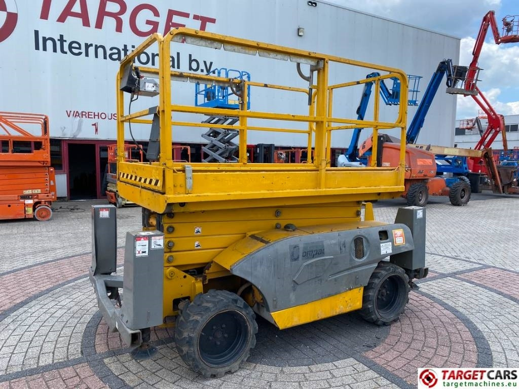 Haulotte Compact 12DX Diesel 4x4 Scissor Work Lift 1206cm - Ножичний підйомник: фото 1 Haulotte Compact 12DX Diesel 4x4 Scissor Work Lift 1206cm - Ножичний підйомник: фото 1