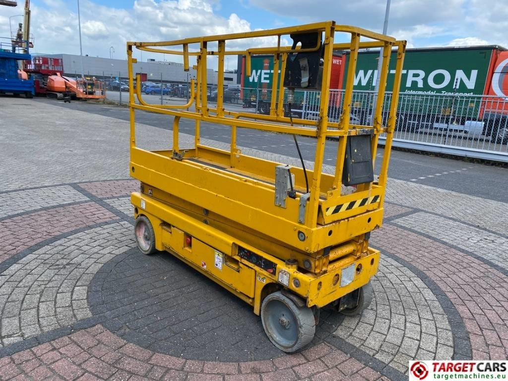 Haulotte Compact 8 Electric Scissor Work Lift 818cm - Ножичний підйомник: фото 2 Haulotte Compact 8 Electric Scissor Work Lift 818cm - Ножичний підйомник: фото 2