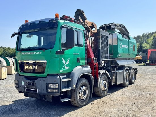 MAN TGS 35.540 8x4 mit Komptech-Zusatzeinheit - Лісозаготівельна техніка, Вантажівка: фото 1 MAN TGS 35.540 8x4 mit Komptech-Zusatzeinheit - Лісозаготівельна техніка, Вантажівка: фото 1