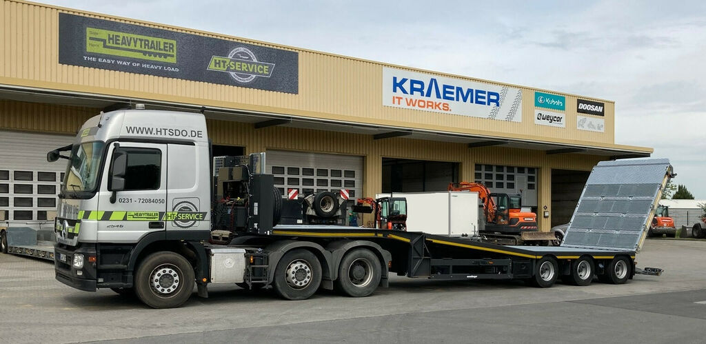 Meusburger 3-Achs-Satteltieflader mit abklappbarem Heck - Низькорамна платформа напівпричіп: фото 1 Meusburger 3-Achs-Satteltieflader mit abklappbarem Heck - Низькорамна платформа напівпричіп: фото 1