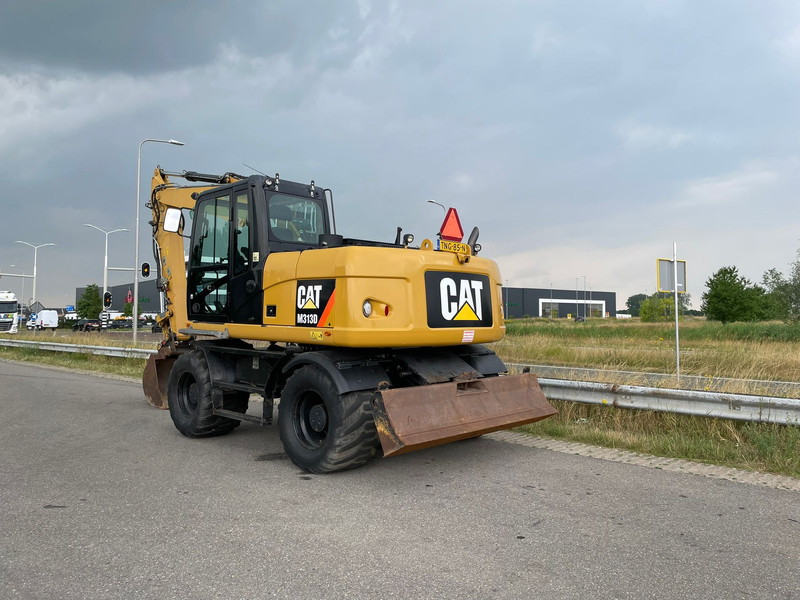 Caterpillar M313D - CE - Колісний екскаватор: фото 1 Caterpillar M313D - CE - Колісний екскаватор: фото 1