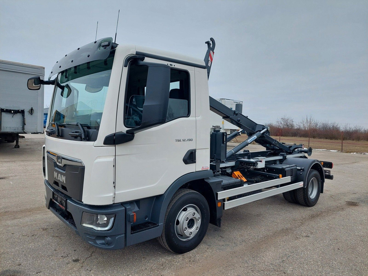 MAN TG3 TGL 12.190 BB 4x2 - Гаковий мультиліфт вантажівка: фото 1 MAN TG3 TGL 12.190 BB 4x2 - Гаковий мультиліфт вантажівка: фото 1