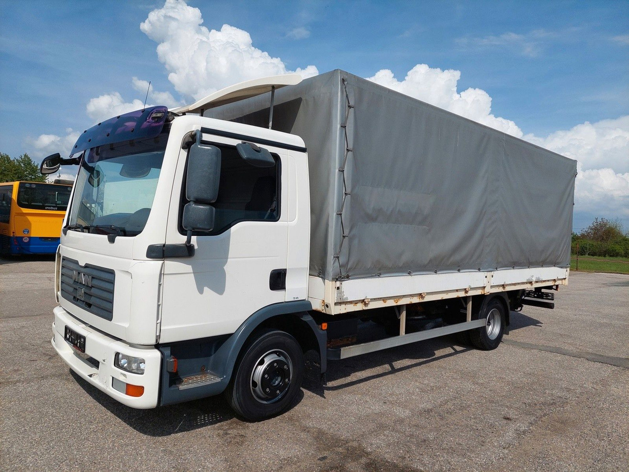 MAN TGL 8.180 4X2 BL - Тентована вантажівка: фото 1 MAN TGL 8.180 4X2 BL - Тентована вантажівка: фото 1