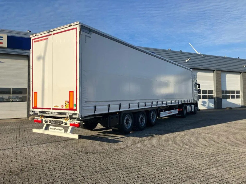Kässbohrer SCS X / 90 - 12 / 27 Schuifzeilen met twee liftassen en hefdak 500mm - Тентований напівпричіп: фото 5 Kässbohrer SCS X / 90 - 12 / 27 Schuifzeilen met twee liftassen en hefdak 500mm - Тентований напівпричіп: фото 5