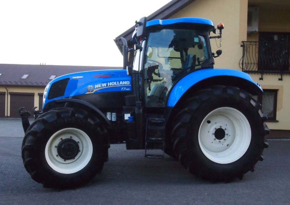 Ciągnik New Holland T7.185 2013 New Holland Autocommand i TUZ - Трактор: фото 2 Ciągnik New Holland T7.185 2013 New Holland Autocommand i TUZ - Трактор: фото 2