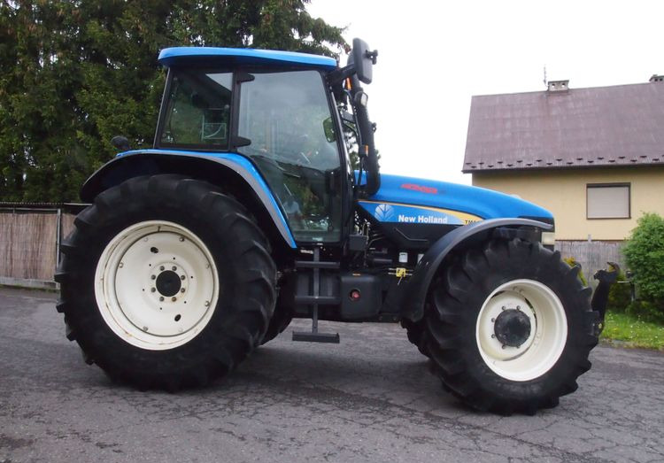 Ciągnik New Holland TM 140 2004 Przedni TUZ - Трактор: фото 4 Ciągnik New Holland TM 140 2004 Przedni TUZ - Трактор: фото 4