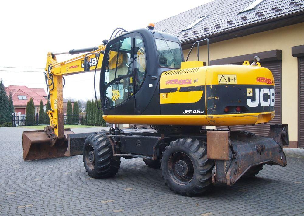 Koparka kołowa JCB JS145W 2011 Koparka JCB - Колісний екскаватор: фото 5 Koparka kołowa JCB JS145W 2011 Koparka JCB - Колісний екскаватор: фото 5
