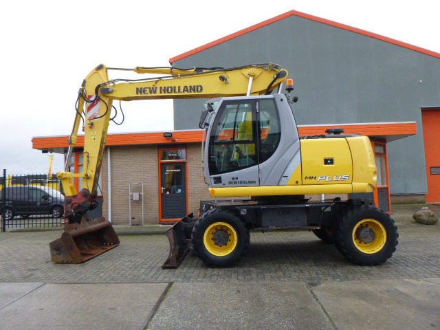 NEW HOLLAND MH PLUS - Колісний екскаватор: фото 2 NEW HOLLAND MH PLUS - Колісний екскаватор: фото 2