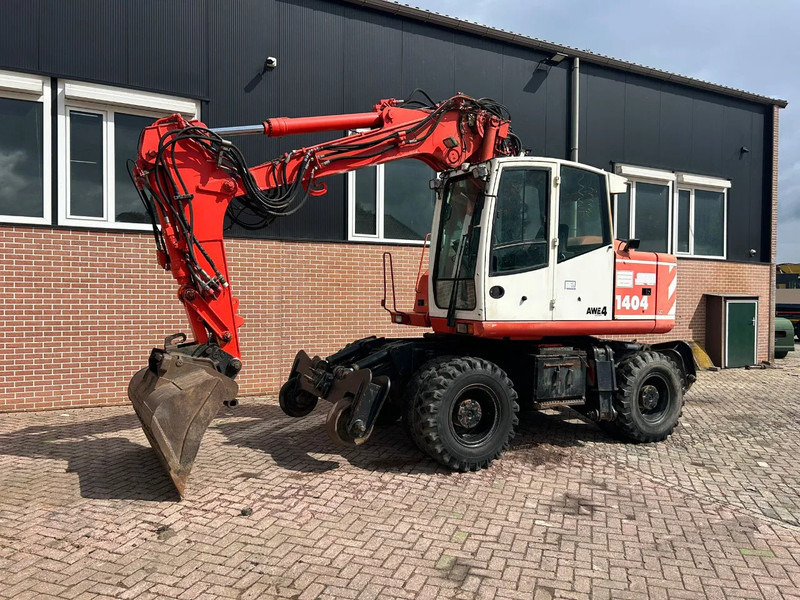 Atlas 1404 - Колісний екскаватор: фото 1 Atlas 1404 - Колісний екскаватор: фото 1