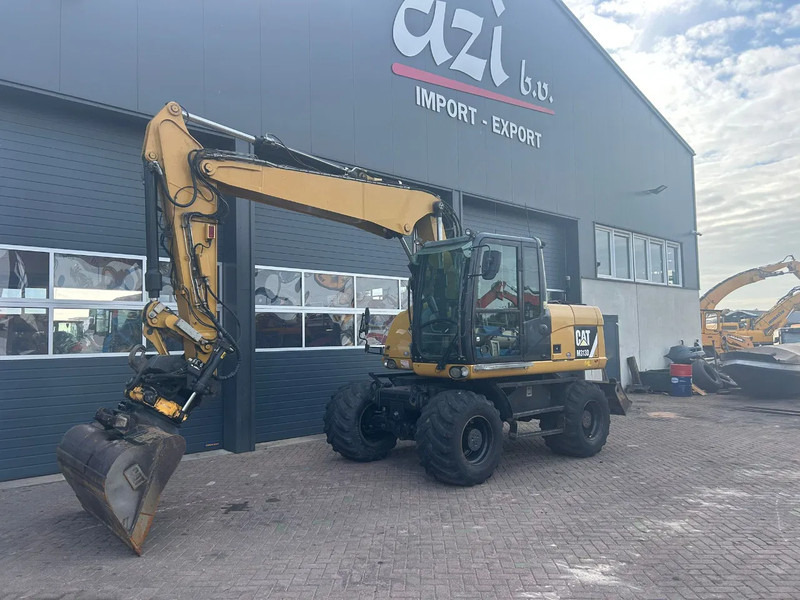 Caterpillar M313D - Колісний екскаватор: фото 1 Caterpillar M313D - Колісний екскаватор: фото 1