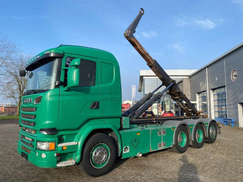 Scania R520 V8 / 8X4 / BIG AXLE / AJK HOOKLIFT 30TON / LIFT+LENKACHSE / NAVI / LEATHER / FULL-AIR / AUTOMATIC / EURO-6 / 2015 - Гаковий мультиліфт вантажівка: фото 1 Scania R520 V8 / 8X4 / BIG AXLE / AJK HOOKLIFT 30TON / LIFT+LENKACHSE / NAVI / LEATHER / FULL-AIR / AUTOMATIC / EURO-6 / 2015 - Гаковий мультиліфт вантажівка: фото 1
