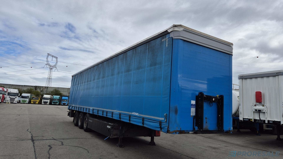 KÖGEL SN 24 CARGO - Тентований напівпричіп: фото 1 KÖGEL SN 24 CARGO - Тентований напівпричіп: фото 1