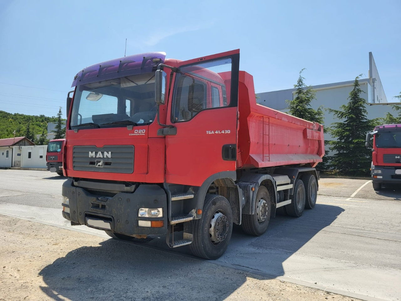 MAN TGA 41.430 8x4 meiller tipper - hydr. back site - Самоскид вантажівка: фото 1 MAN TGA 41.430 8x4 meiller tipper - hydr. back site - Самоскид вантажівка: фото 1