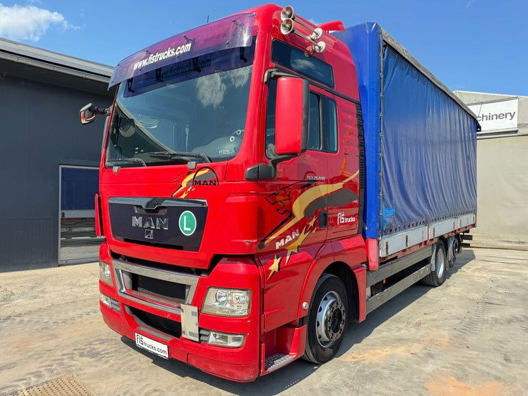 MAN TGX 26.440 6x2 box truck - retarder - lifting+steering axle - Вантажівка з закритим кузовом: фото 1 MAN TGX 26.440 6x2 box truck - retarder - lifting+steering axle - Вантажівка з закритим кузовом: фото 1