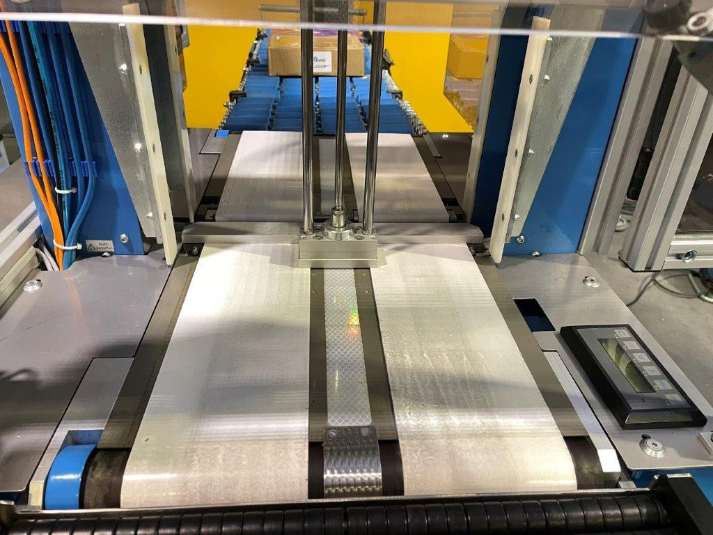 ATS Tanner UltraSonic US 2000-AB transit banding machine with pneumatic product hold-down and infeed roller table - Пакувальне обладнання: фото 5 ATS Tanner UltraSonic US 2000-AB transit banding machine with pneumatic product hold-down and infeed roller table - Пакувальне обладнання: фото 5