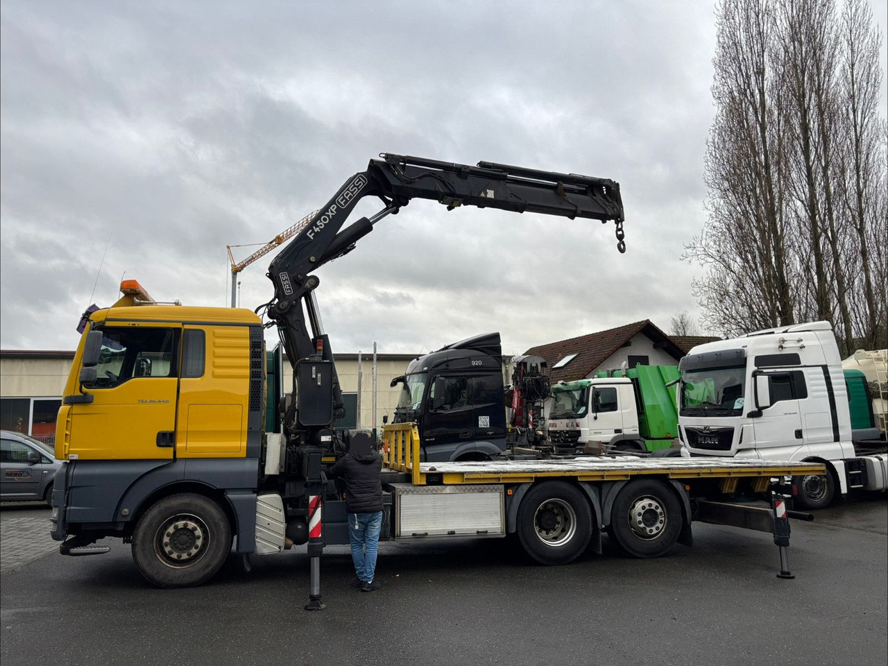 MAN TGA 26.440 FASSI F450AXP Containerauf./Lenkachse - Вантажівка з маніпулятором: фото 2 MAN TGA 26.440 FASSI F450AXP Containerauf./Lenkachse - Вантажівка з маніпулятором: фото 2