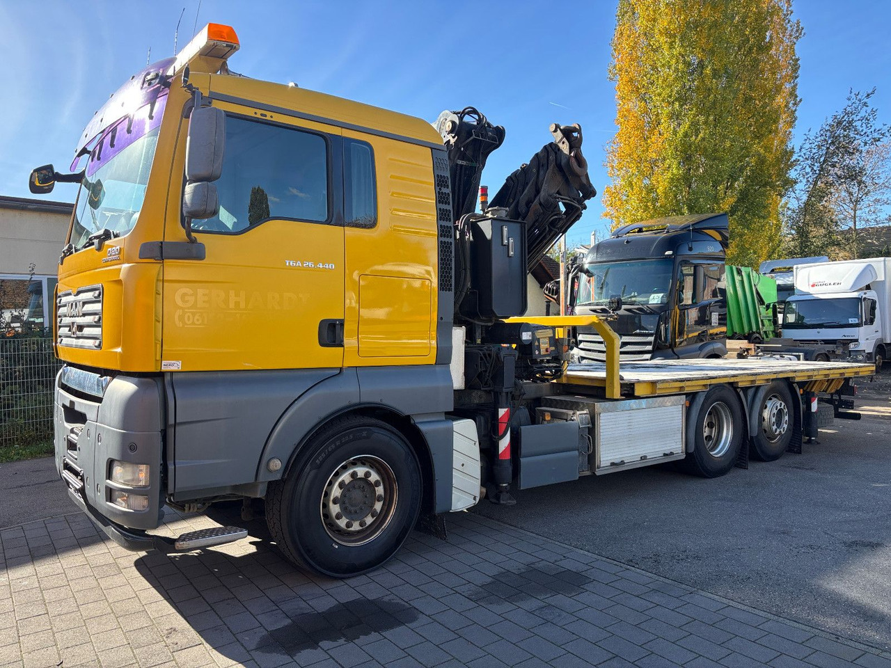 MAN TGA 26.440 FASSI F450AXP Containerauf./Lenkachse - Вантажівка з маніпулятором: фото 1 MAN TGA 26.440 FASSI F450AXP Containerauf./Lenkachse - Вантажівка з маніпулятором: фото 1