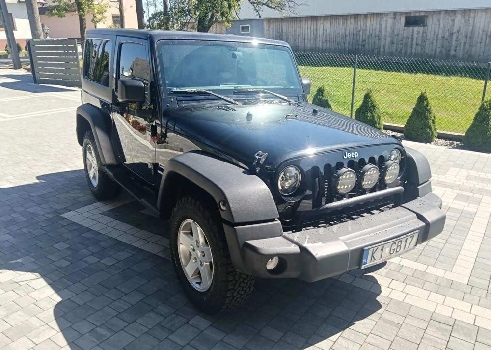 Jeep Wrangler 2.8 CRD Sport - Позашляховик: фото 2 Jeep Wrangler 2.8 CRD Sport - Позашляховик: фото 2