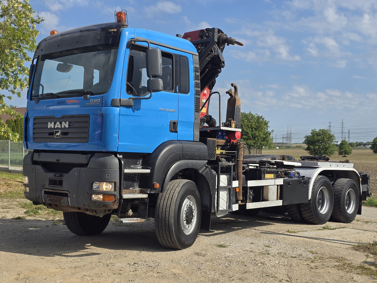 MAN TGA 33.430 6X6 / HMF 1823 K3+REM.CON./ HOOK SYSTEM - Гаковий мультиліфт вантажівка, Вантажівка з маніпулятором: фото 1 MAN TGA 33.430 6X6 / HMF 1823 K3+REM.CON./ HOOK SYSTEM - Гаковий мультиліфт вантажівка, Вантажівка з маніпулятором: фото 1