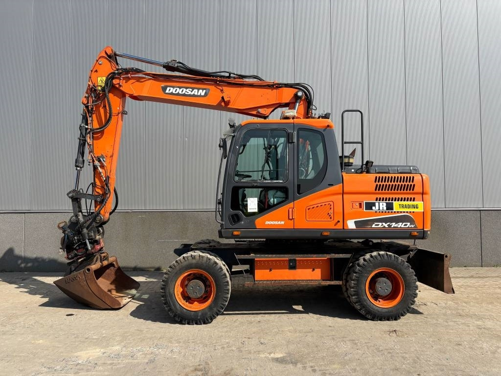 Doosan DX 140 W-5 (R5 Rototilt) - Колісний екскаватор: фото 1 Doosan DX 140 W-5 (R5 Rototilt) - Колісний екскаватор: фото 1