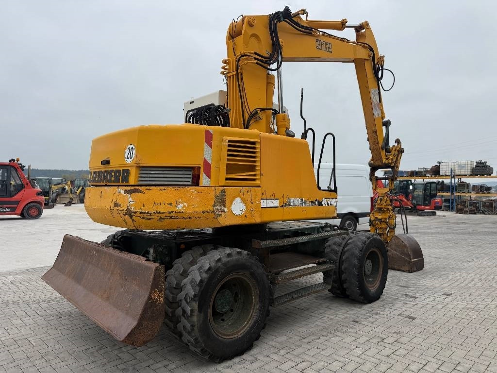 Liebherr A 312 - Колісний екскаватор: фото 5 Liebherr A 312 - Колісний екскаватор: фото 5