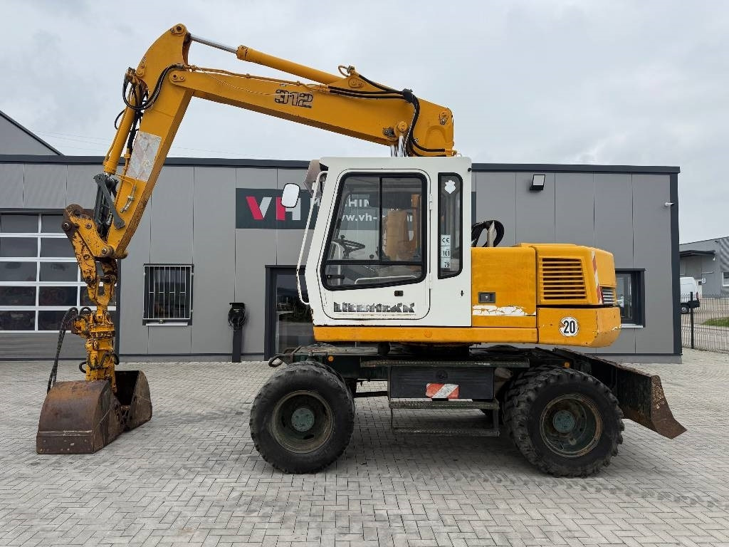 Liebherr A 312 - Колісний екскаватор: фото 2 Liebherr A 312 - Колісний екскаватор: фото 2