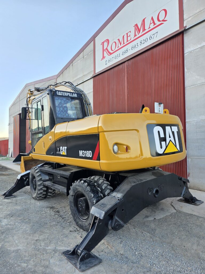 CAT M318D - Колісний екскаватор: фото 2 CAT M318D - Колісний екскаватор: фото 2