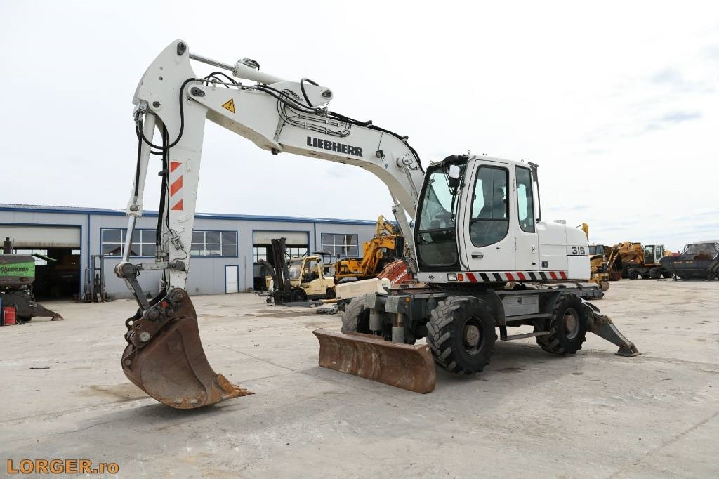 Liebherr A 316 Litronic - Колісний екскаватор: фото 5 Liebherr A 316 Litronic - Колісний екскаватор: фото 5