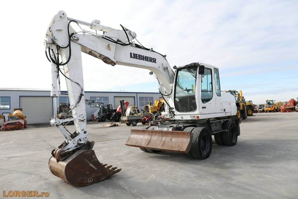 Liebherr A 316 Litronic - Колісний екскаватор: фото 1 Liebherr A 316 Litronic - Колісний екскаватор: фото 1