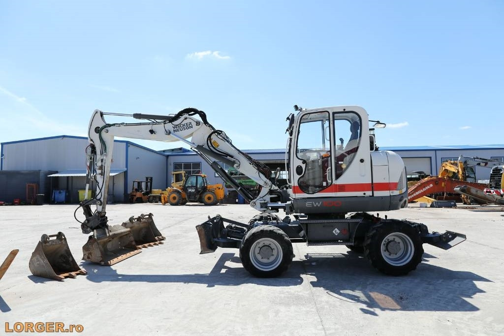 Wacker Neuson EW 100 - Колісний екскаватор: фото 1 Wacker Neuson EW 100 - Колісний екскаватор: фото 1