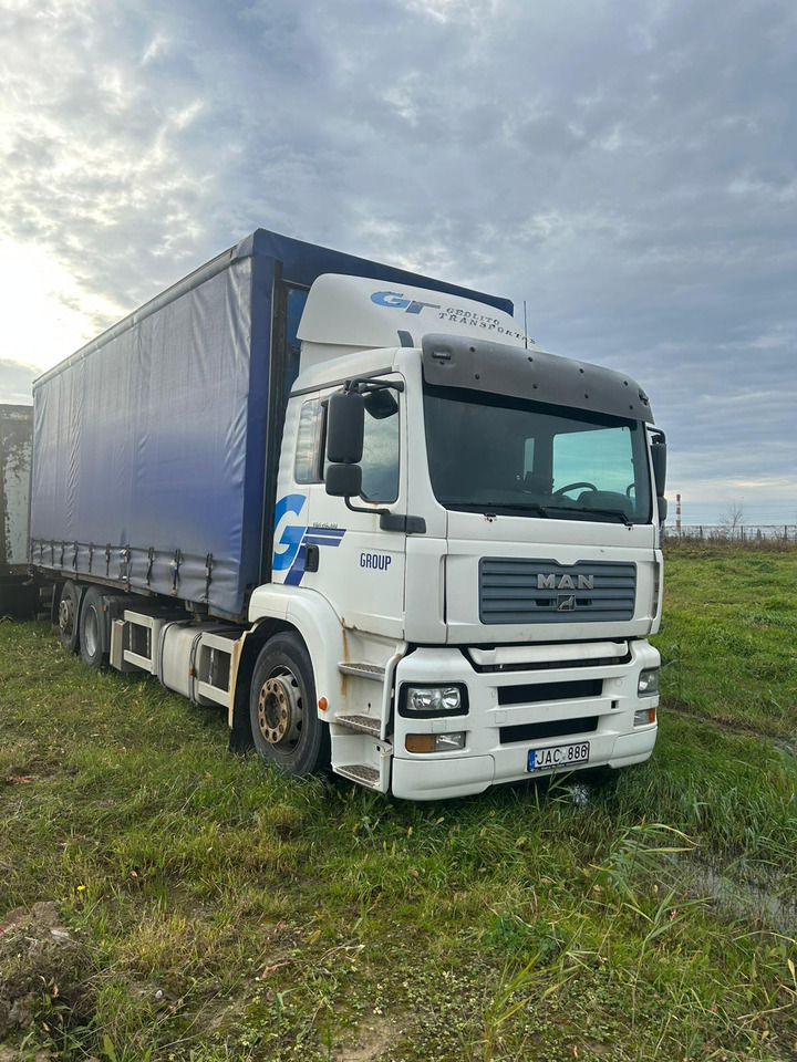 MAN TGA 26.310 - Тентована вантажівка: фото 1 MAN TGA 26.310 - Тентована вантажівка: фото 1