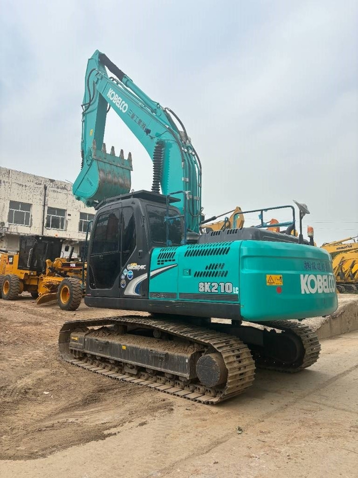 Kobelco SK 210 - Гусеничний екскаватор: фото 5 Kobelco SK 210 - Гусеничний екскаватор: фото 5