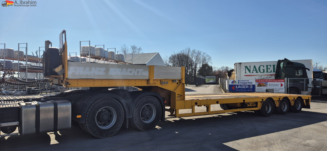 Faymonville 3-A ausziehbar bis 18,90 m zwangsgelenkt - Низькорамна платформа напівпричіп: фото 1 Faymonville 3-A ausziehbar bis 18,90 m zwangsgelenkt - Низькорамна платформа напівпричіп: фото 1