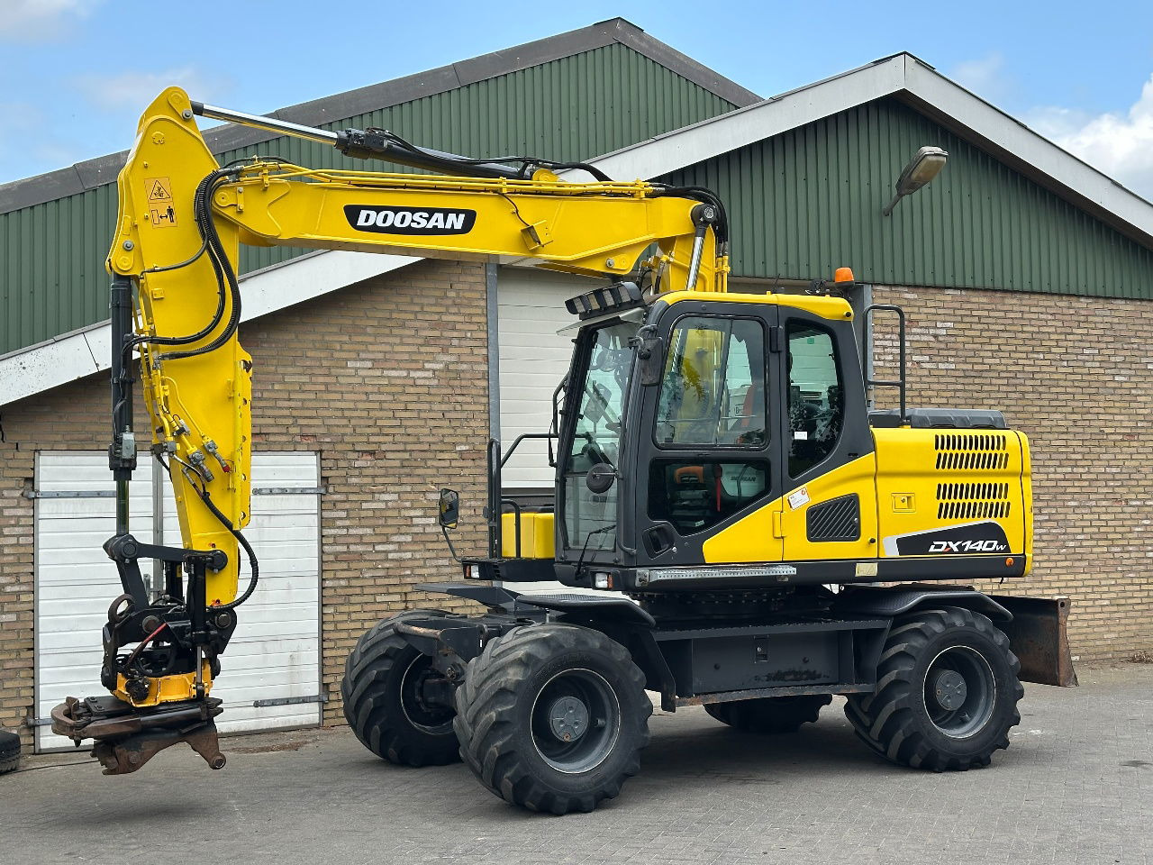 Doosan DX140W-5 - Колісний екскаватор: фото 2 Doosan DX140W-5 - Колісний екскаватор: фото 2