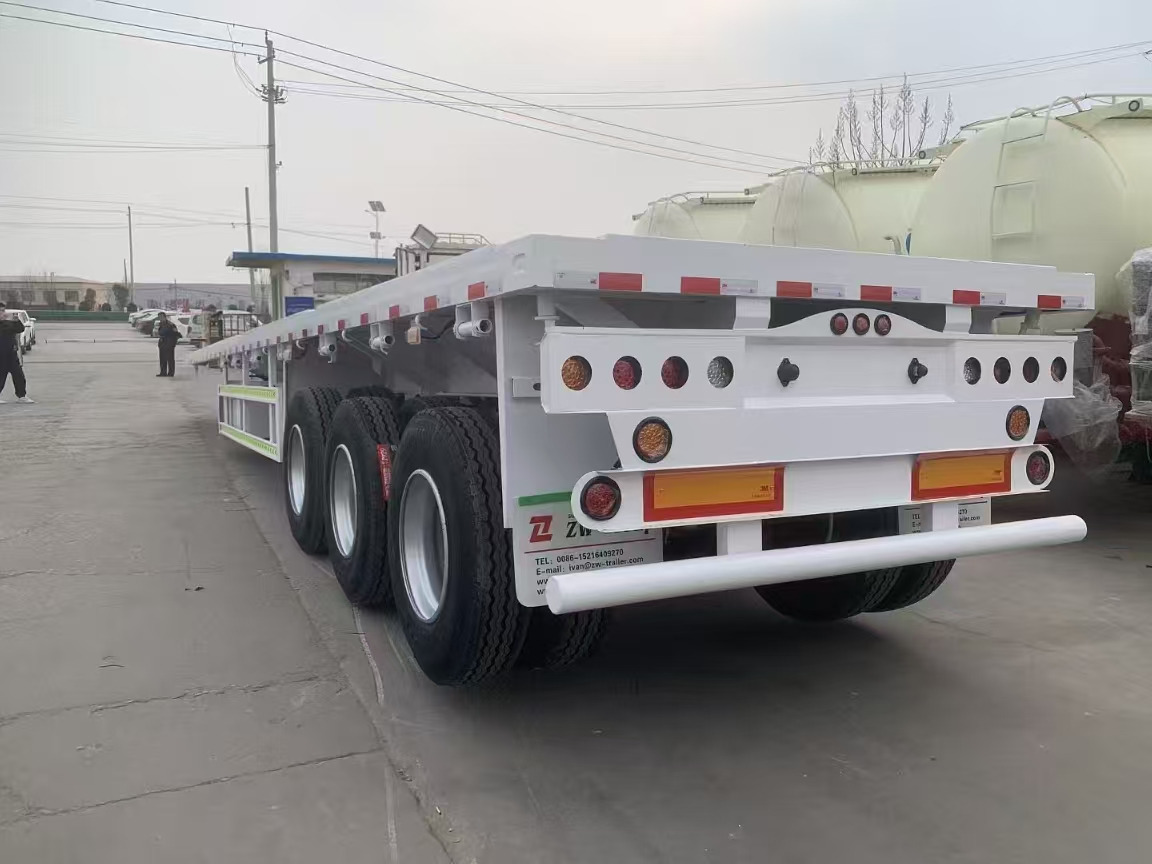 ZHICHENG Semi Flat Bed Low Bed Lowboy bed truck in New or Used Condition and various Size for Sale - Низькорамна платформа напівпричіп: фото 3 ZHICHENG Semi Flat Bed Low Bed Lowboy bed truck in New or Used Condition and various Size for Sale - Низькорамна платформа напівпричіп: фото 3