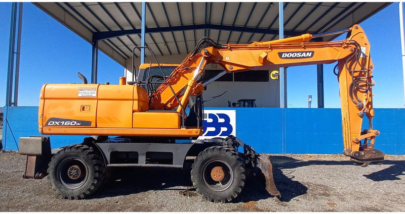 Doosan DX140W-3 - Колісний екскаватор: фото 2 Doosan DX140W-3 - Колісний екскаватор: фото 2
