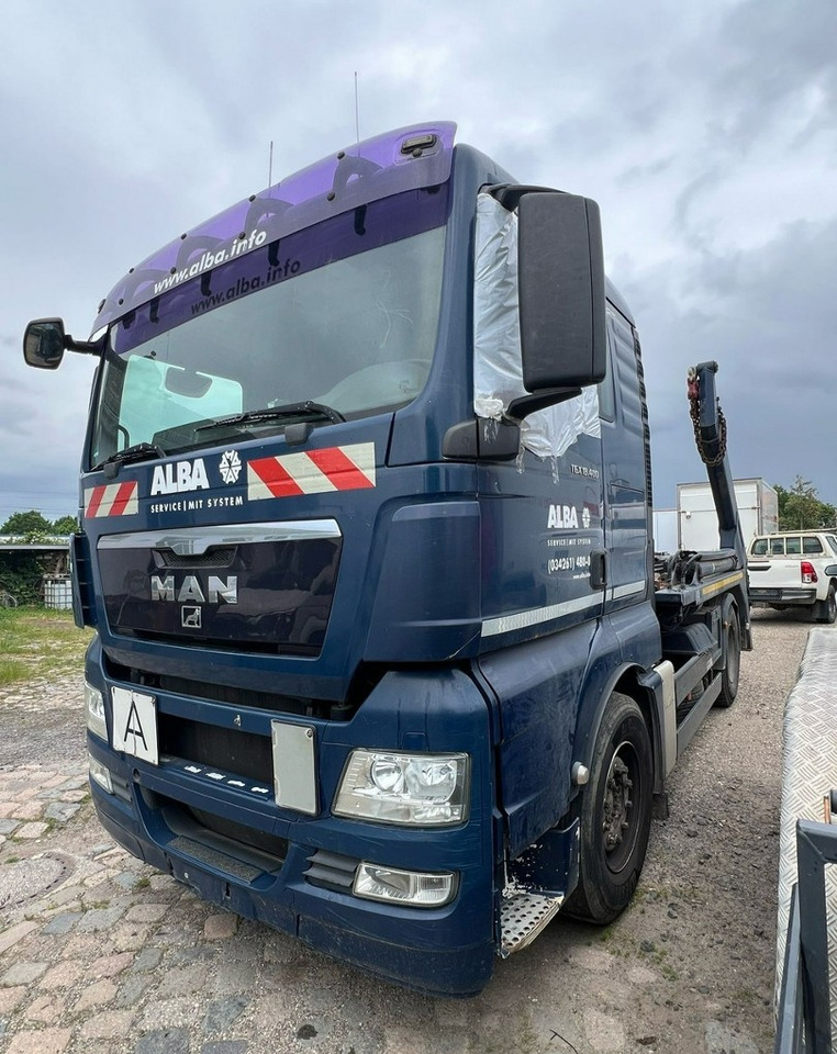 MAN Inny MAN Man TGX 18.400 Bramowiec hakowiec Meiler Model 2012 - Скіповий навантажувач вантажівка: фото 1 MAN Inny MAN Man TGX 18.400 Bramowiec hakowiec Meiler Model 2012 - Скіповий навантажувач вантажівка: фото 1
