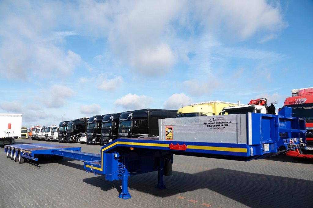 Nooteboom NISKOPODWOZIE / ROZCIĄGANA / 4 OSIOWA / OSIE SKR Nooteboom NISKOPODWOZIE / ROZCIĄGANA / 4 OSIOWA / OSIE SKR - Низькорамна платформа напівпричіп: фото 5 Nooteboom NISKOPODWOZIE / ROZCIĄGANA / 4 OSIOWA / OSIE SKR Nooteboom NISKOPODWOZIE / ROZCIĄGANA / 4 OSIOWA / OSIE SKR - Низькорамна платформа напівпричіп: фото 5