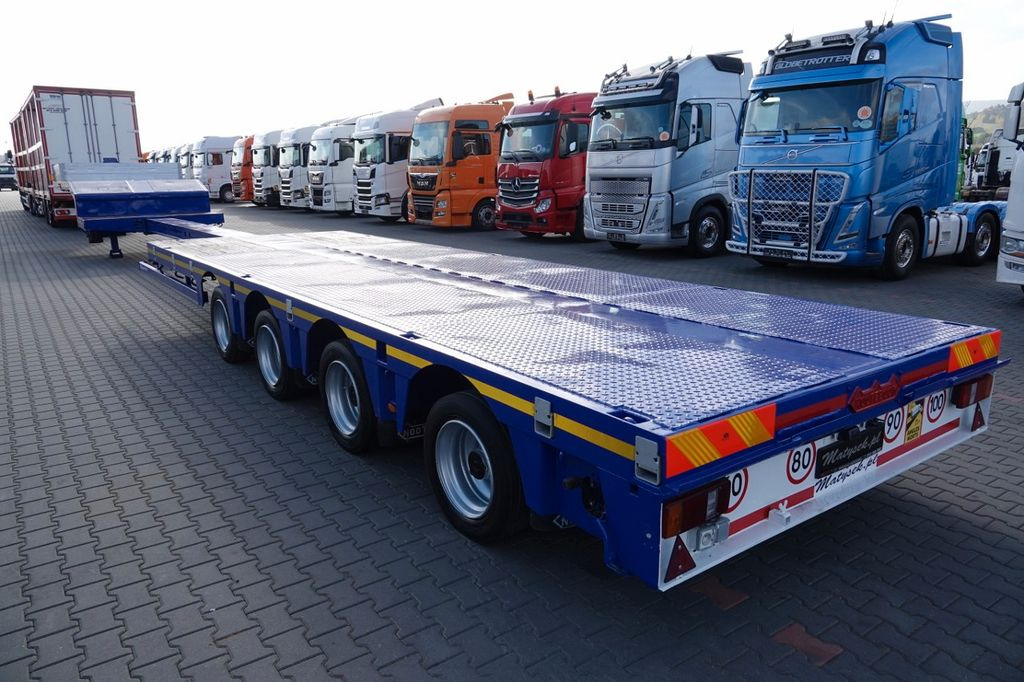 Nooteboom NISKOPODWOZIE / ROZCIĄGANA / 4 OSIOWA / OSIE SKR Nooteboom NISKOPODWOZIE / ROZCIĄGANA / 4 OSIOWA / OSIE SKR - Низькорамна платформа напівпричіп: фото 3 Nooteboom NISKOPODWOZIE / ROZCIĄGANA / 4 OSIOWA / OSIE SKR Nooteboom NISKOPODWOZIE / ROZCIĄGANA / 4 OSIOWA / OSIE SKR - Низькорамна платформа напівпричіп: фото 3