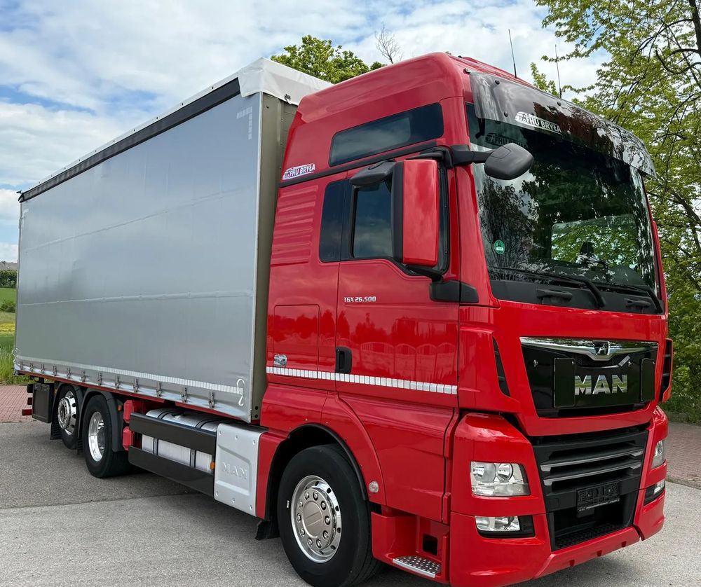 MAN TGX 26.500 / LIFT / 6X2 / KLIMA POSTOJOWA / 18PALET / E6 / FIRANKA / 18 TON ŁADOWNOŚĆ / WINDA / NISKI PRZEBIEG / JEDEN WŁAŚCICIEL / PODWIESZANA OŚ - Тентована вантажівка: фото 2 MAN TGX 26.500 / LIFT / 6X2 / KLIMA POSTOJOWA / 18PALET / E6 / FIRANKA / 18 TON ŁADOWNOŚĆ / WINDA / NISKI PRZEBIEG / JEDEN WŁAŚCICIEL / PODWIESZANA OŚ - Тентована вантажівка: фото 2