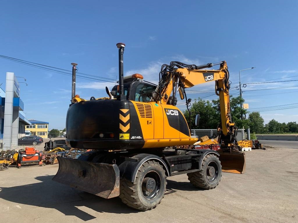JCB JS 145 W+Engcon Rototilt+Sistem Laser 2D Leica Ico - Колісний екскаватор: фото 4 JCB JS 145 W+Engcon Rototilt+Sistem Laser 2D Leica Ico - Колісний екскаватор: фото 4