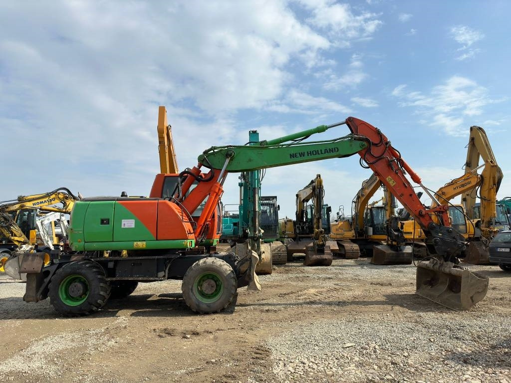 New Holland MH Plus - Колісний екскаватор: фото 2 New Holland MH Plus - Колісний екскаватор: фото 2