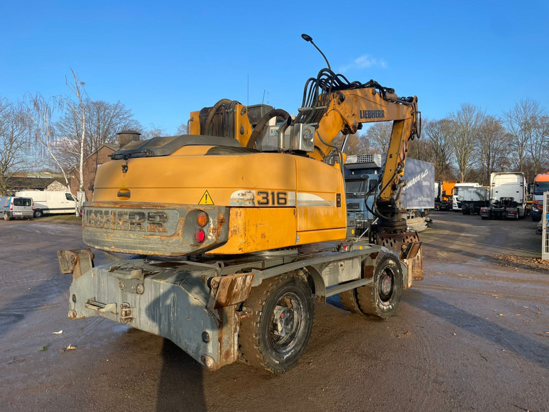 Liebherr A 316 - Перевантажувач: фото 3 Liebherr A 316 - Перевантажувач: фото 3