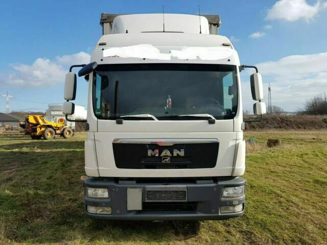 MAN TGL8.240 G.Haus/2xBett Klima AHK - Тентований фургон: фото 1 MAN TGL8.240 G.Haus/2xBett Klima AHK - Тентований фургон: фото 1